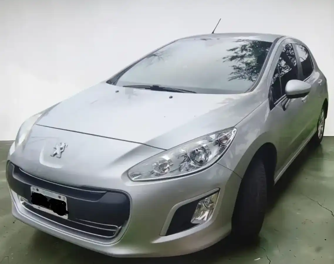 Peugeot 308 2014 - foto 1