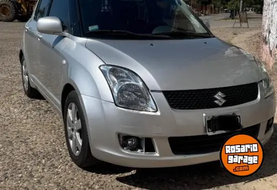 Suzuki Swift 2010 - foto 1