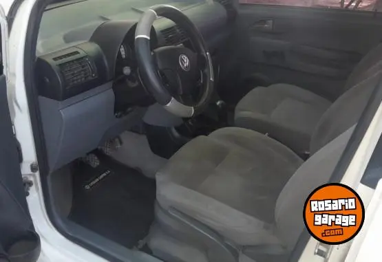 Volkswagen Suran  2010 - foto 5