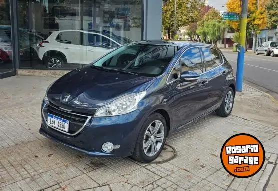 Peugeot 208 Feline 1.6N 16V  2014 - foto 1