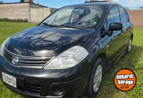 Nissan Tiida  2013 - foto 1