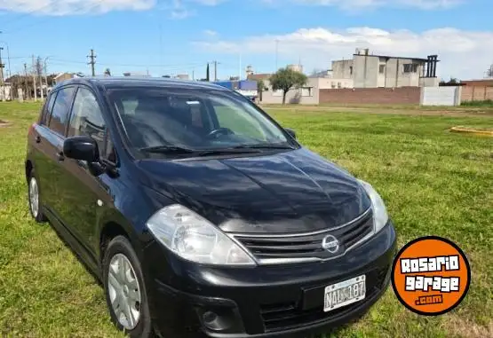Nissan Tiida  2013 - foto 2