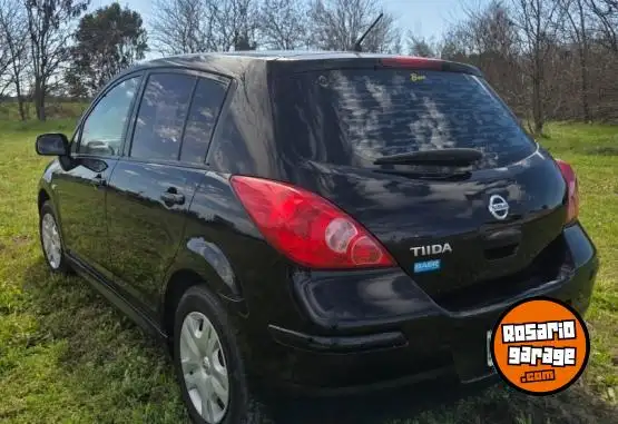 Nissan Tiida  2013 - foto 3