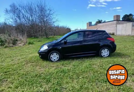 Nissan Tiida  2013 - foto 4