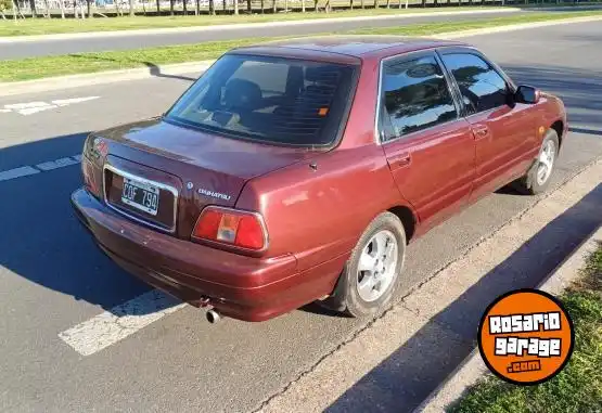 Daihatsu Applause Xi  1999 - foto 3