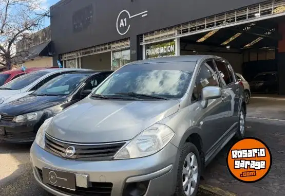Nissan Tiida  2014 - foto 1