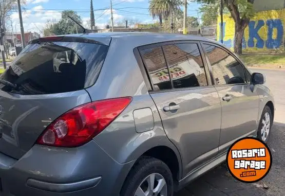 Nissan Tiida  2014 - foto 4