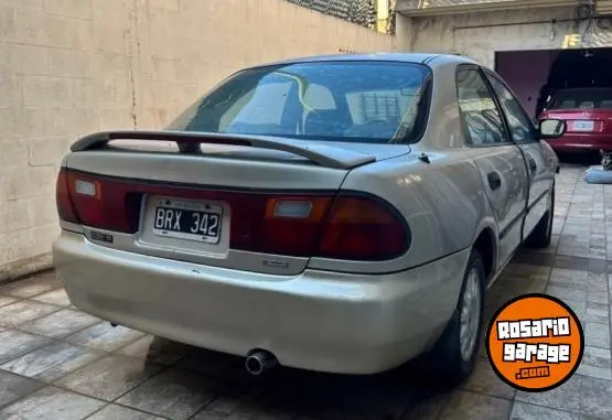Mazda 323  1998 - foto 2