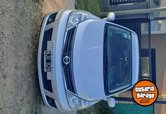 Nissan Tiida  2014 - foto 1